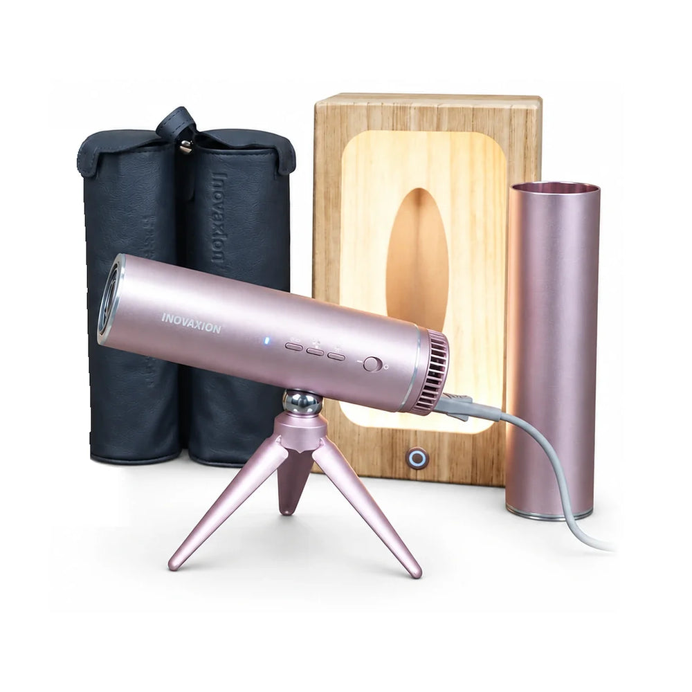 HandsFreeDryer kit in Sunset Rose — hands-free hair dryer on its folding tripod with travel capsule, wall mount and gift box